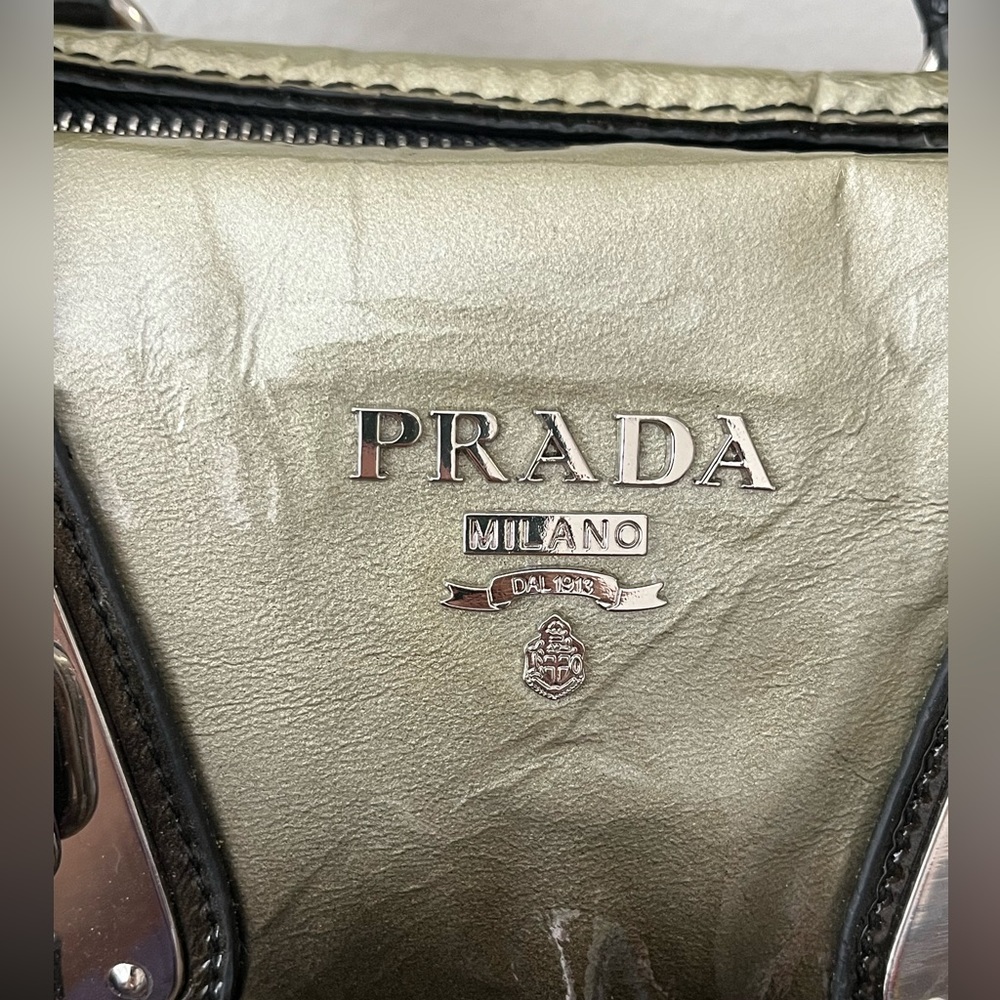 Vintage Prada Vernice Sfumata Bauletto Bag
Handles have decorative hardware. - Picture 9 of 15